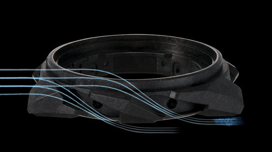 Matte black watch case with aerodynamic blue airflow lines illustrating wind resistance against a dark background.