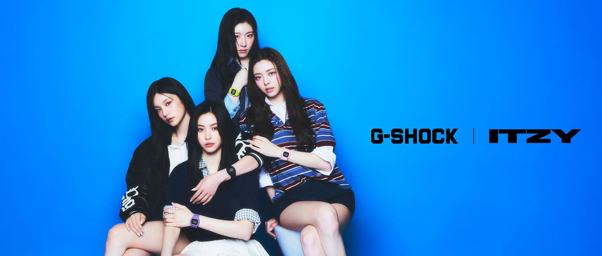 The K-pop group ITZY posing against a vibrant blue background, wearing stylish casual outfits and G-Shock watches.