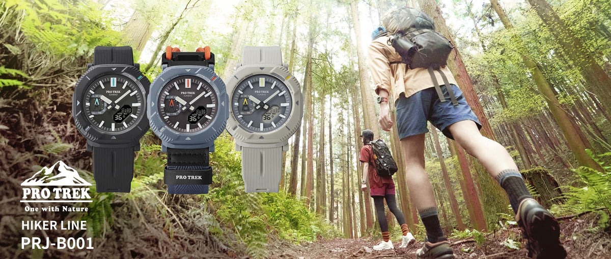 Three Casio Pro Trek PRJ-B001 watches in black, blue, and beige displayed beside hikers walking through a forest.
