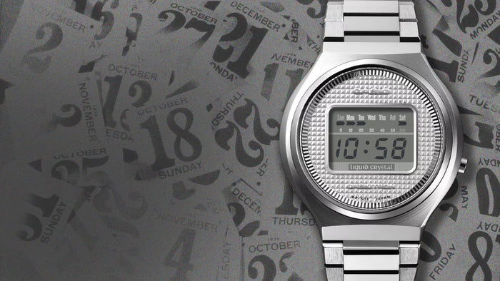 Vintage silver Casio Casiotron digital watch with a textured dial against a background of overlapping calendar dates.