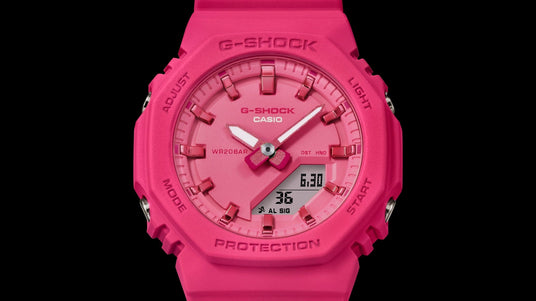 Bright pink Casio G-Shock watch with an analog-digital display and durable resin construction.