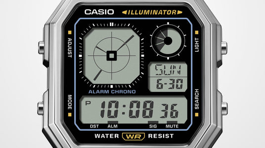 Close-up of a silver Casio Illuminator digital watch face with a black display, analog-style map dial, and time indicators.