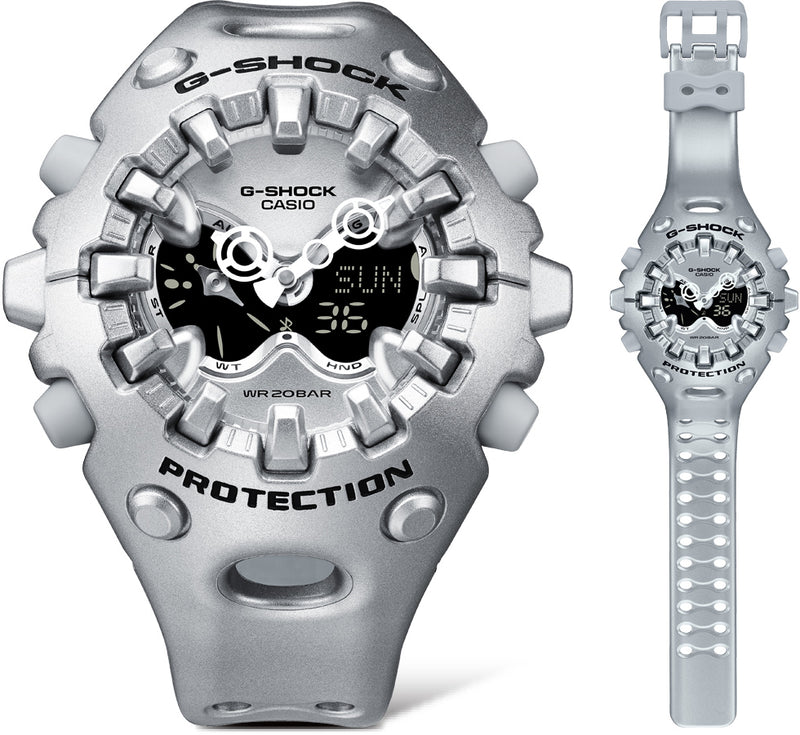 Metallic silver Casio G-Shock watch with a rugged, industrial design, analog-digital display, and perforated resin strap.
