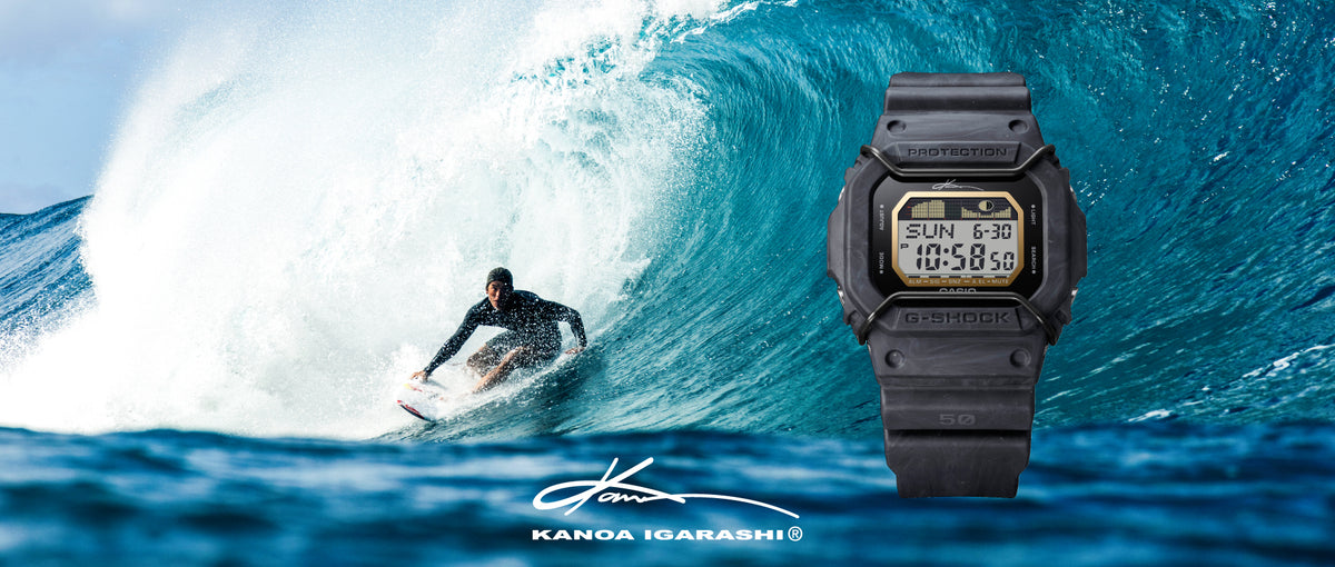 Black G-Shock digital watch with bull bars overlaid on a surfer riding a large blue ocean wave.
